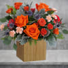 Sure to brighten any day, this Retro Brights Arrangement of radiant orange