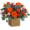 Sure to brighten any day, this Retro Brights Arrangement of radiant orange