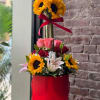 Sunflower arrangement with lilies for any occasion.