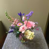 Designers choice arrangement of seasonal pastel flowers. Flowers will vary by what&#039;s