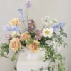 Designers choice arrangement using fresh seasonal hand picked market flowers.
Minimal modern style.
Flower