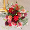 Designers choice in season fall wildflowers wrapped bouquet.