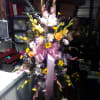 A standing arrangement of assorted beautiful flowers