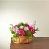 Inspired by bright shades and soft textures, this arrangement will wow your