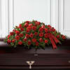 The Tribute of Life Casket Spray bursts with the love and passion