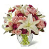 The Perfect Day Arrangement extends warmth and sunlit cheer through the beauty