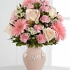 The Mother&#039;s Charm Arrangement is a sweet and beautiful way to celebrate