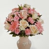 The Mother&#039;s Charm Arrangement is a sweet and beautiful way to celebrate