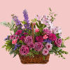 This lush lavender rose arrangement is a basket of beauty to brighten