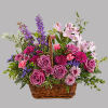 This lush lavender rose arrangement is a basket of beauty to brighten