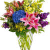 Celebrate love and grace with our exquisite arrangement featuring an enchanting mixture