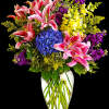 Celebrate love and grace with our exquisite arrangement featuring an enchanting mixture