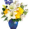 Like a sunny day at the shore, this bright arrangement invigorates and