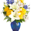 Like a sunny day at the shore, this bright arrangement invigorates and
