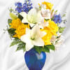 Like a sunny day at the shore, this bright arrangement invigorates and