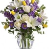 Graceful, elegant and timeless, this beautiful spring bouquet offers up colors, blossoms