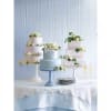 Delicate sweet peas and roses with classic green ivy give an English