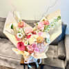 Hydrangea, Garden Roses, Branches, Ranunculus, Stock and Calla Lilies in a wrapped