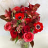 The Crimson Dream Bouquet is a mesmerizing blend of passion and sophistication