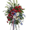 Easel spray clustered flowers in red, white and blue
