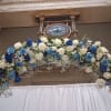 Beautiful mix of unusual light and dark blue roses, white roses, alstroemeria