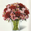 Capture your sweetheart&#039;s attention with this stunning arrangement filled with deep red