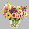 Spring&rsquo;s natural beauty, captured in flowers. Our charming bouquet features a loose