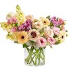 Spring&rsquo;s natural beauty, captured in flowers. Our charming bouquet features a loose