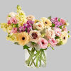Spring&rsquo;s natural beauty, captured in flowers. Our charming bouquet features a loose