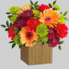 Talk about a bright idea! This cheerful arrangement of pink roses and