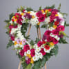 Honor the memory of a loved one with our Elegant Sympathy Flower