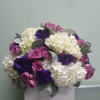 Box arrangement with hydrangeas, spray roses, and lisianthus.