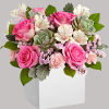 Capture their heart with the shimmering oasis arrangement, blooming for their special