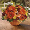 This pumpkin is sure to please! Send your special someone fall flowers
