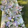 15 vases packed with elegant, garden like, ethereal stems of pastel blooms