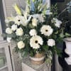 Mix of white blooms to express your sympathy
