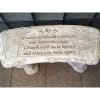 A CONCRETE GARDEN BENCH FEATURING MANY INSPIRATIONAL SAYINGS.*Please note that if you
