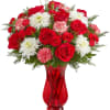 Give the gift of joy with our festive mix of blooms. This