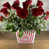This arrangement includes hydrangea, tulips, freesia, succulents and other seasonal blooms. This