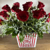 This arrangement includes hydrangea, tulips, freesia, succulents and other seasonal blooms. This