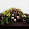 The Forever Beloved Casket Spray beautifully illuminates the atmosphere of their final