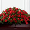 The Tribute of Life Casket Spray bursts with the love and passion