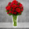 The Sweethearts Arrangement blooms with roses and mini carnations to help you