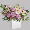 Make spring shimmer with this luxurious lavender arrangement, hand-delivered in a wooden