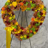 **Golden Remembrance**: A breathtaking display of fall's beauty, this heart spray is