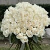 Our bouquet of white roses embodies elegance and purity. These exquisite flowers
