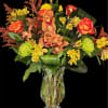 Delicate clear glass vase  with stunning combination of orchid , roses