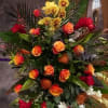The &quot;Divine Sunset&quot; arrangement is a beautiful tribute that captures the warmth