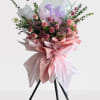 Celebrate your new venture with this elegant flower stand, designed to mark