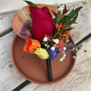 Need a boutonniere for a special occasion? We can help! We are